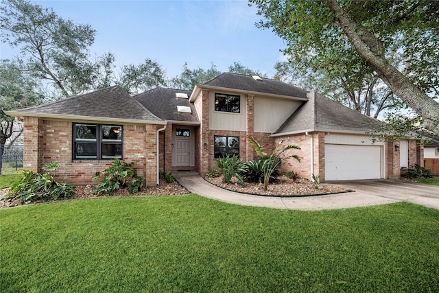 4611 Diamond Springs Dr, Missouri City, TX 77459 - view of front of home with roof with shingles, driveway, a garage, and brick siding
