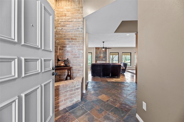 4611 Diamond Springs Dr, Missouri City, TX 77459 - foyer entrance with stone tile flooring and a ceiling fan