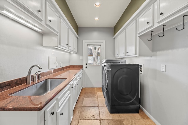 4611 Diamond Springs Dr, Missouri City, TX 77459 - laundry area featuring stone tile floors, cabinet space, recessed lighting, and independent washer and dryer
