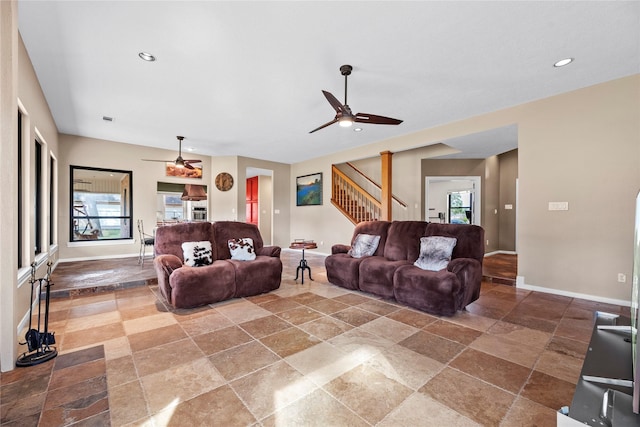 4611 Diamond Springs Dr, Missouri City, TX 77459 - living area with ceiling fan, stairs, plenty of natural light, stone tile floors, and recessed lighting