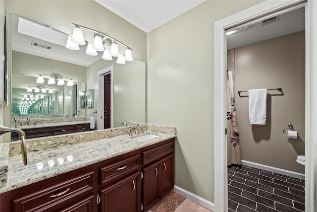 4611 Diamond Springs Dr, Missouri City, TX 77459 - full bath with vanity and baseboards