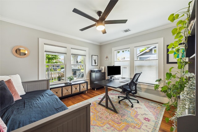 1014 E 25th St, Houston, TX 77009 - office with ceiling fan, wood finished floors, and ornamental molding