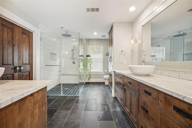 1014 E 25th St, Houston, TX 77009 - full bath featuring vanity, a stall shower, and recessed lighting