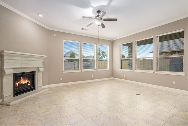 20226 Overland Hills Ln, Cypress, TX 77433 - unfurnished living room featuring a ceiling fan, crown molding, a premium fireplace, and stone tile flooring