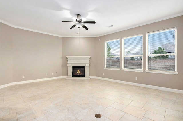 20226 Overland Hills Ln, Cypress, TX 77433 - unfurnished living room with ceiling fan, a glass covered fireplace, and ornamental molding