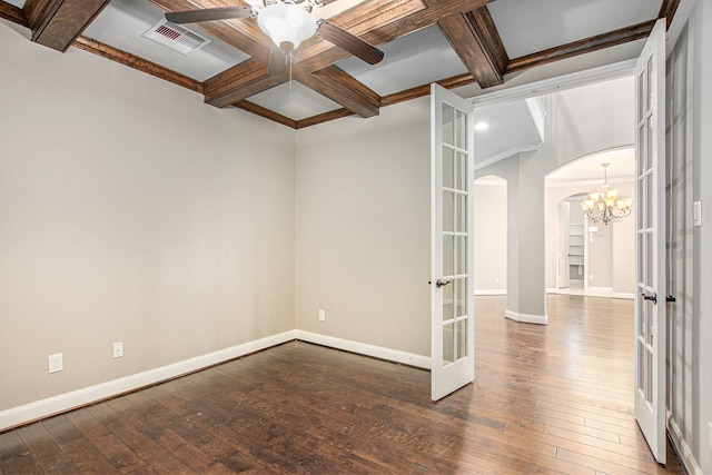 20226 Overland Hills Ln, Cypress, TX 77433 - empty room with coffered ceiling, arched walkways, french doors, hardwood / wood-style flooring, and beam ceiling