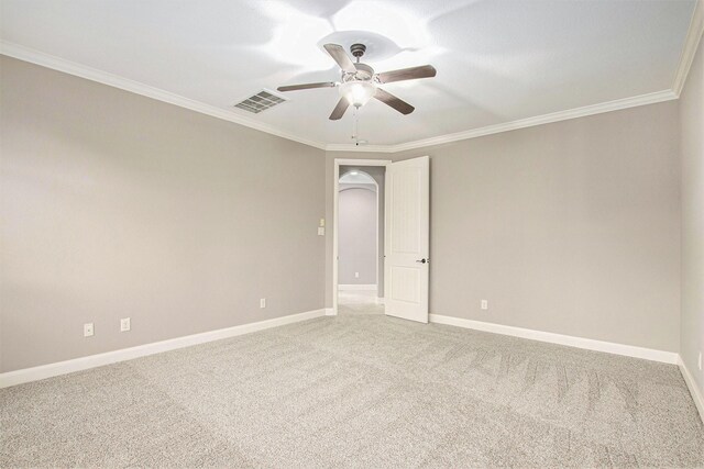 20226 Overland Hills Ln, Cypress, TX 77433 - empty room featuring a ceiling fan, crown molding, carpet flooring, and arched walkways