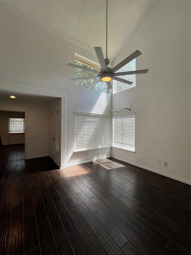 2372 Woodland Park Dr Unit 121, Houston, TX 77077 - spare room with high vaulted ceiling, ceiling fan, wood finished floors, a textured ceiling, and crown molding