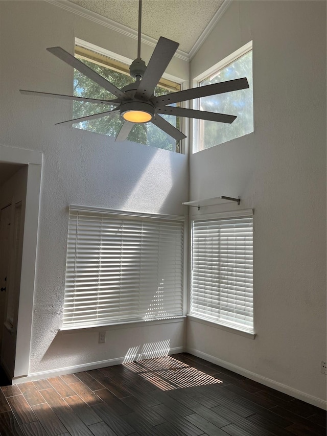 2372 Woodland Park Dr Unit 121, Houston, TX 77077 - spare room with lofted ceiling, ornamental molding, wood finished floors, and a ceiling fan