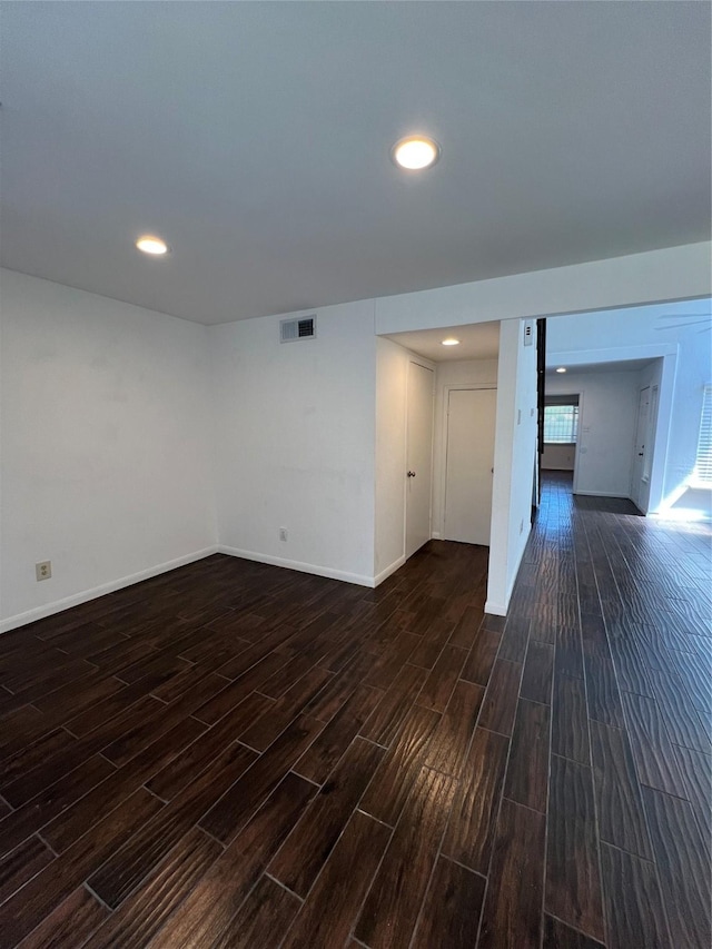 2372 Woodland Park Dr Unit 121, Houston, TX 77077 - unfurnished room with dark wood-style flooring and recessed lighting