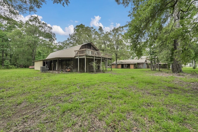17230 Pioneer Trl, Conroe, TX 77302 - view of green lawn with an outbuilding