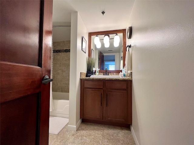 3525 Sage Rd Unit 1502, Houston, TX 77056 - bathroom featuring vanity, tile patterned flooring, and shower / tub combination