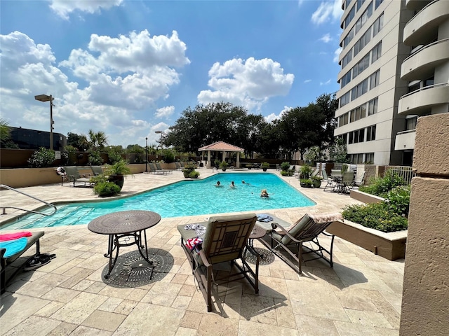 3525 Sage Rd Unit 1502, Houston, TX 77056 - community pool featuring a patio and a gazebo