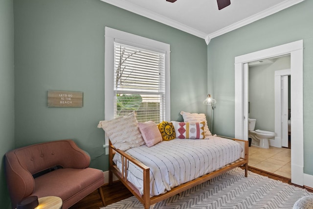 2413 34th St, Galveston, TX 77550 - bedroom featuring crown molding, ensuite bath, and ceiling fan