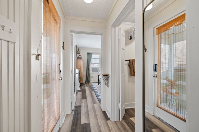 2413 34th St, Galveston, TX 77550 - hallway with wood finished floors, ornamental molding, and cooling unit