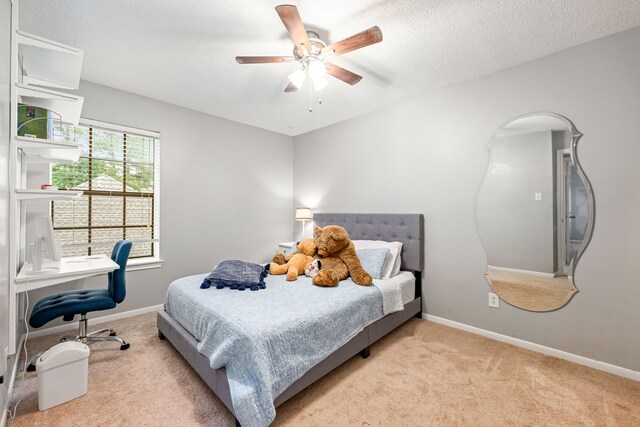 6 Heathstone Pl, The Woodlands, TX 77381 - bedroom featuring carpet flooring, a ceiling fan, an office area, and a textured ceiling
