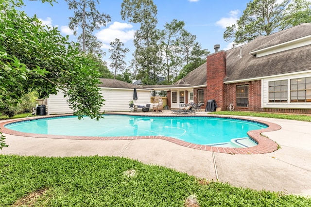 6 Heathstone Pl, The Woodlands, TX 77381 - outdoor pool featuring a patio area