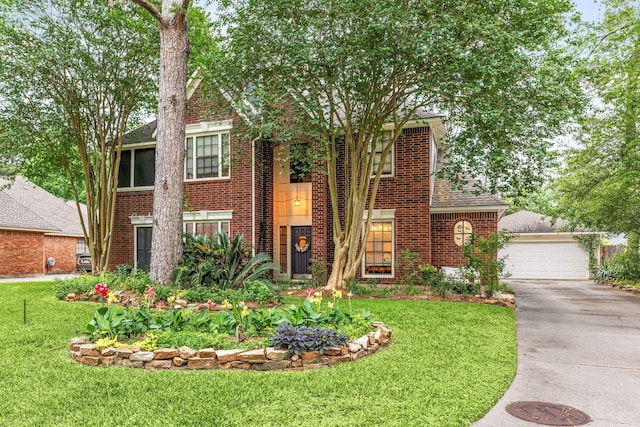 6 Heathstone Pl, The Woodlands, TX 77381 - view of front of property with brick siding and a front lawn