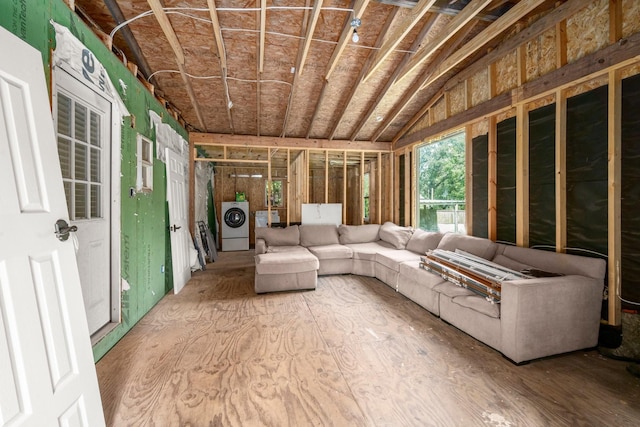 26145 Shadow Ln, New Caney, TX 77357 - unfurnished sunroom with washer / clothes dryer and vaulted ceiling