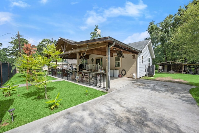 26145 Shadow Ln, New Caney, TX 77357 - back of house featuring a patio area