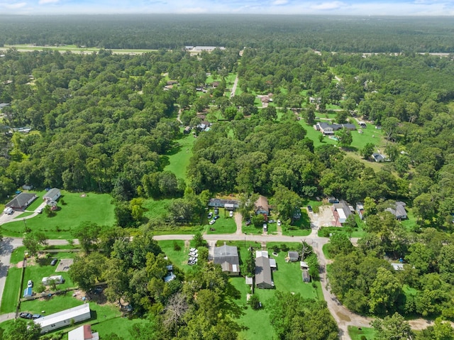 26145 Shadow Ln, New Caney, TX 77357 - aerial view of property and surrounding area with a heavily wooded area