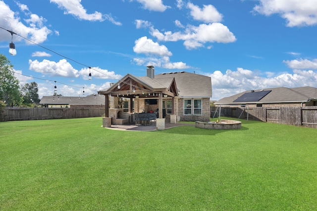 16003 Cypress Farms Dr, Cypress, TX 77429 - back of house with a patio, a fenced backyard, brick siding, and a chimney