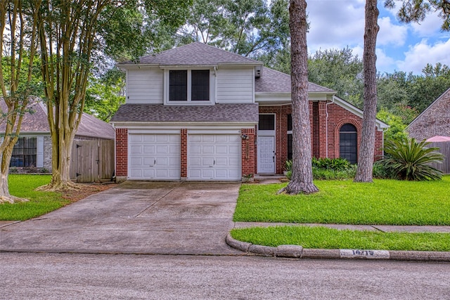 14715 Cobre Valley Dr, Houston, TX 77062 - view of front of property featuring a shingled roof, a garage, driveway, and brick siding