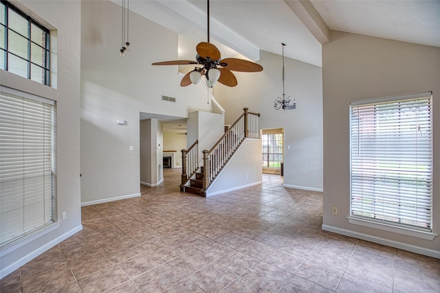 14715 Cobre Valley Dr, Houston, TX 77062 - unfurnished living room with stairs, high vaulted ceiling, a ceiling fan, beam ceiling, and a chandelier