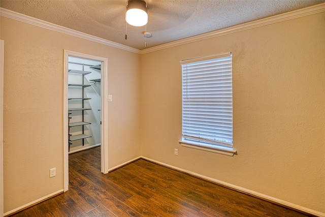 14715 Cobre Valley Dr, Houston, TX 77062 - spare room with wood finished floors, crown molding, a textured ceiling, a ceiling fan, and healthy amount of natural light