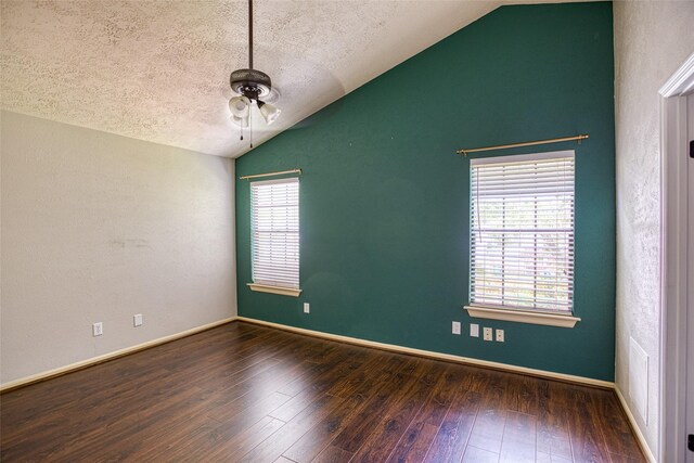 14715 Cobre Valley Dr, Houston, TX 77062 - spare room with vaulted ceiling, a ceiling fan, wood finished floors, and a textured ceiling