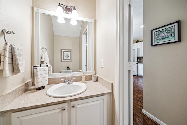 29708 Parliament Hills Dr, Spring, TX 77386 - half bath featuring vanity and wood finished floors
