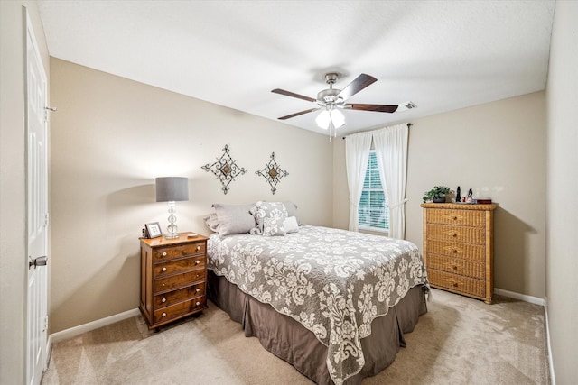 29708 Parliament Hills Dr, Spring, TX 77386 - bedroom with light carpet and ceiling fan