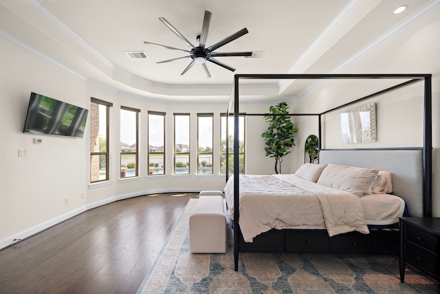 28106 Island Manor Ln, Fulshear, TX 77441 - bedroom featuring a raised ceiling, crown molding, wood finished floors, recessed lighting, and ceiling fan