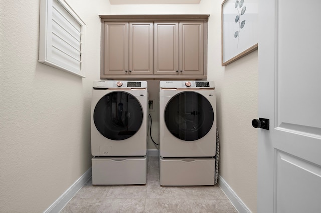 28106 Island Manor Ln, Fulshear, TX 77441 - laundry room with washing machine and clothes dryer and cabinet space
