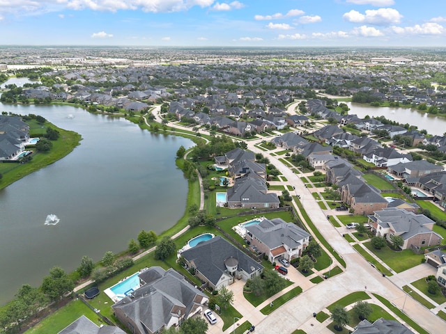28106 Island Manor Ln, Fulshear, TX 77441 - aerial overview of property's location with nearby suburban area and a nearby body of water