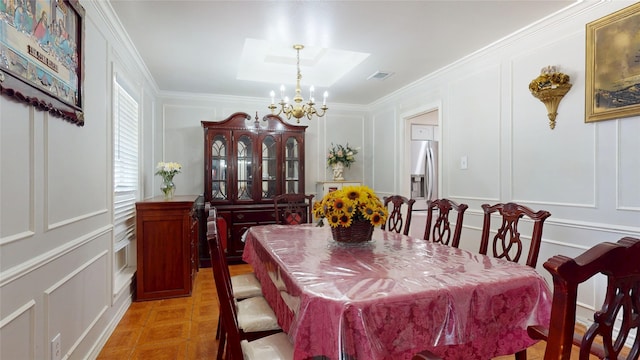 9030 Troulon Dr, Houston, TX 77036 - dining space with a decorative wall, a chandelier, a skylight, and ornamental molding