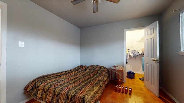 9030 Troulon Dr, Houston, TX 77036 - bedroom with tile patterned flooring and a ceiling fan