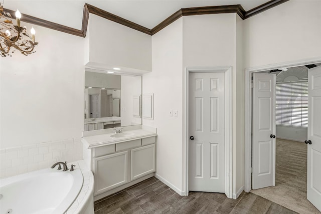 1123 Misty Lake Dr, Sugar Land, TX 77498 - bathroom featuring ornamental molding, vanity, a whirlpool tub, and a chandelier