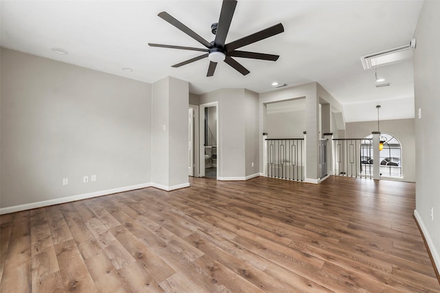 1123 Misty Lake Dr, Sugar Land, TX 77498 - unfurnished room with attic access, a ceiling fan, wood finished floors, and recessed lighting