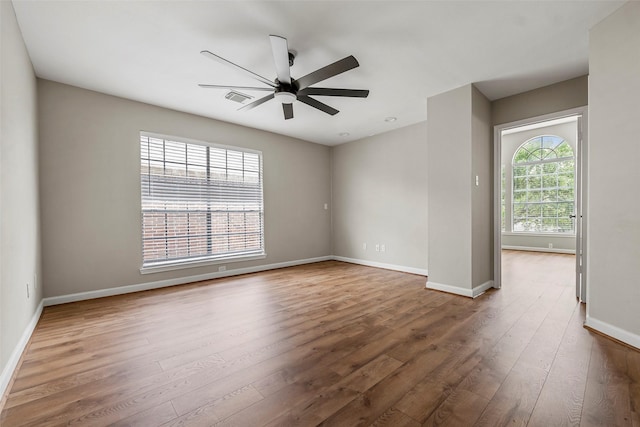 1123 Misty Lake Dr, Sugar Land, TX 77498 - empty room featuring wood finished floors and a ceiling fan