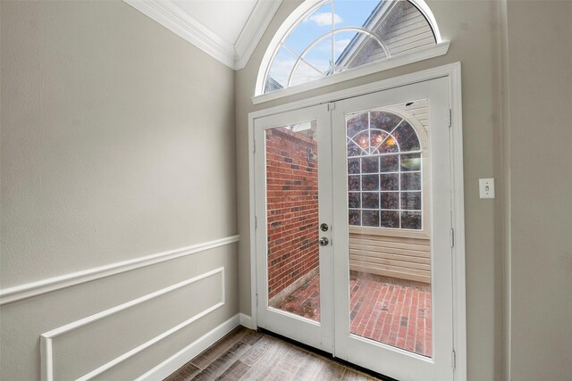 1123 Misty Lake Dr, Sugar Land, TX 77498 - entryway with ornamental molding, wood finished floors, and french doors