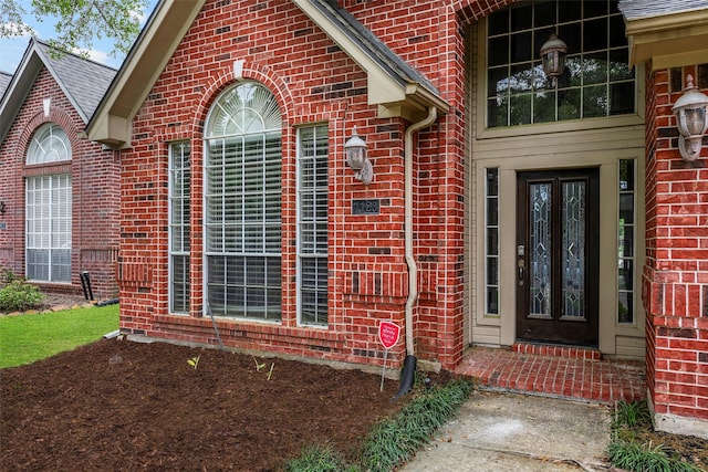 1123 Misty Lake Dr, Sugar Land, TX 77498 - doorway to property featuring french doors and brick siding