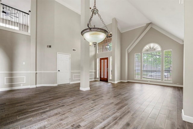 1123 Misty Lake Dr, Sugar Land, TX 77498 - unfurnished living room with high vaulted ceiling and wood finished floors