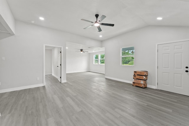 1615 Hiller St, Houston, TX 77015 - unfurnished living room featuring a ceiling fan, wood finished floors, lofted ceiling, and recessed lighting