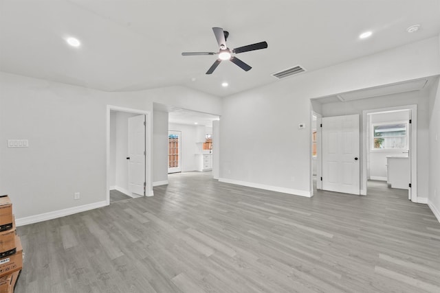 1615 Hiller St, Houston, TX 77015 - unfurnished living room featuring wood finished floors, ceiling fan, attic access, and recessed lighting