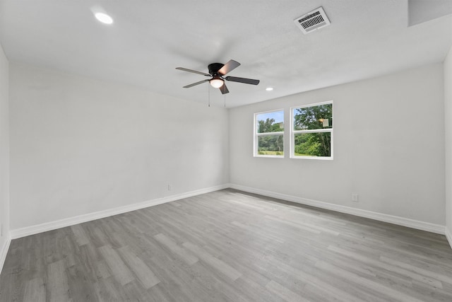 1615 Hiller St, Houston, TX 77015 - unfurnished room with a ceiling fan, wood finished floors, and recessed lighting