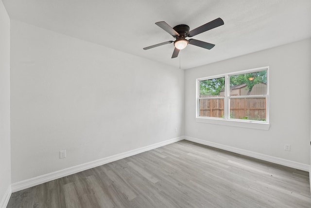 1615 Hiller St, Houston, TX 77015 - empty room with wood finished floors and ceiling fan