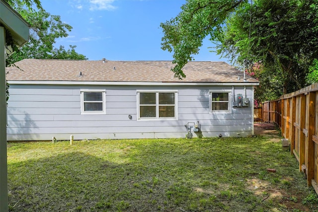 1615 Hiller St, Houston, TX 77015 - rear view of house with a fenced backyard and a shingled roof