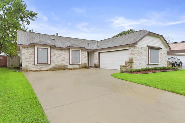 14707 Payette Dr, Houston, TX 77040 - view of front of property with brick siding, driveway, and roof with shingles