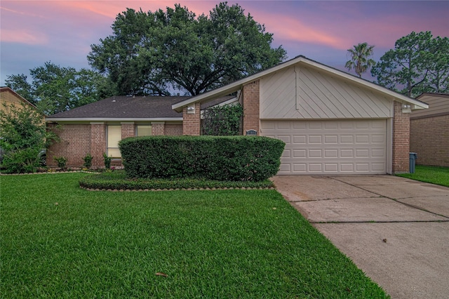 15814 Brookford Dr, Houston, TX 77059 - view of front of property featuring brick siding, concrete driveway, a yard, and an attached garage